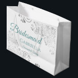 Silver Lace Teal on White Bridesmaid Wedding Large Gift Bag<br><div class="desc">These beautiful gift bags are designed as a wedding gift or favor bag for your Bridesmaids. They feature a simple yet elegant design with silver faux foil lace frills and teal or turquoise colored text reading "Bridesmaid" written in fancy script letters. There is also a place to enter her name,...</div>