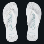 Silver Lace & Teal on White The Bride Wedding Flip Flops<br><div class="desc">Dance the night away with these beautiful wedding flip flops. Designed for the bride, they feature a simple yet elegant design with teal or turquoise colored script lettering on a white background and fancy silver gray lace curls and swirls. Beautiful way to stay fancy and appropriate while giving your feet...</div>