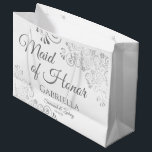 Silver Lace White Maid of Honor Wedding Large Gift Bag<br><div class="desc">This beautiful gift bag is designed as a wedding gift or favor bag for the Maid of Honor. It features an elegant design with silver faux foil lace frills and the text "Maid of Honor" as well as a place to enter her name, the couple's name, and the wedding date....</div>