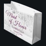Silver & Magenta on White Maid of Honor Wedding Large Gift Bag<br><div class="desc">This beautiful gift bag is designed as a wedding gift or favor bag for the Maid of Honor. It features an elegant design with ornate silver faux foil frills and cassis purple, magenta, red plum, or berry colored text reading "Maid of Honor" as well as a place to enter her...</div>