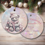Silver Pink Christmas Teddy Bear Granddaughter Ceramic Ornament<br><div class="desc">Here's a beautiful keepsake ornament for that special daughter, niece, or granddaughter! The front features an image of a silver teddy bear dressed in a pale pink winter cap and festive bow. He is surrounded by pink and silver decorations. The image is placed on a pink, lavender, and blue bokeh...</div>