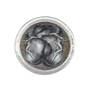Silver ring with woman and flowers
