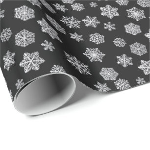 Silver snowflakes on a black background wrapping paper