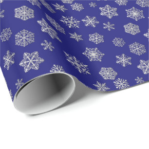 Silver snowflakes on a blue background wrapping paper