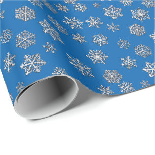 Silver snowflakes on a cobalt blue background wrapping paper