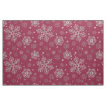 Silver snowflakes on dark red fabric