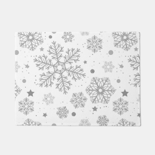 Silver snowflakes on white doormat