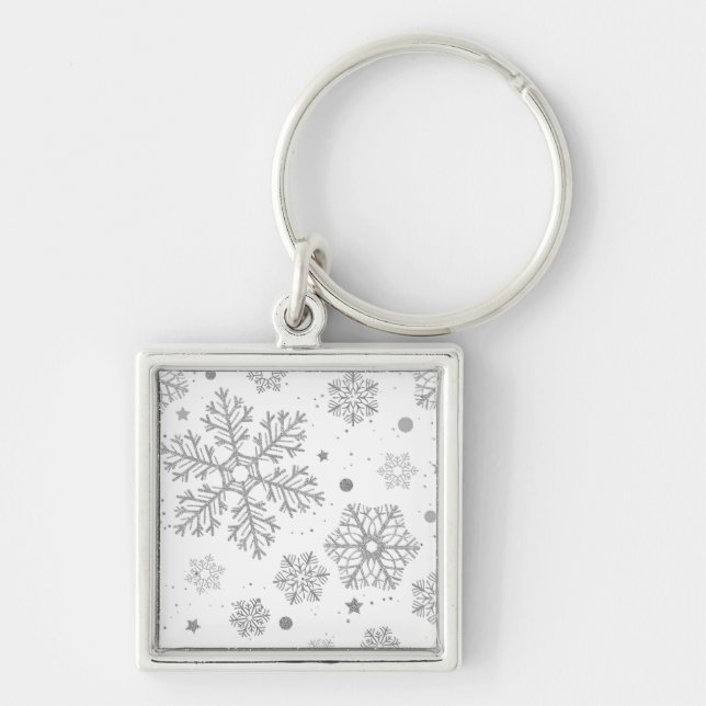 Silver snowflakes on white keychain (Front)