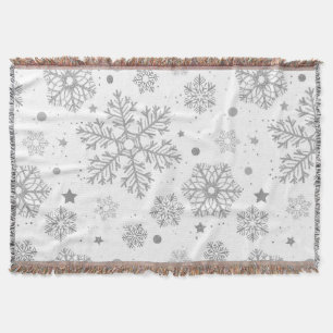 Silver snowflakes on white throw blanket
