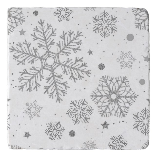 Silver snowflakes on white trivet (Front)