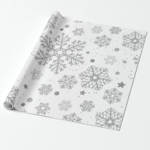 Silver snowflakes on white wrapping paper