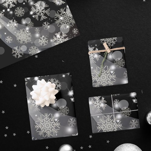 Silver Snowflakes Sparkles And Lights On Black Wrapping Paper Sheets