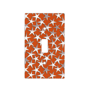 Silver stars on copper light switch cover