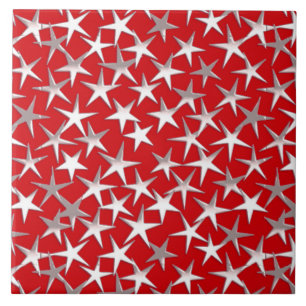 Silver stars on dark red ceramic tile