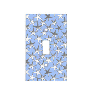 Silver stars, on pale blue light switch cover
