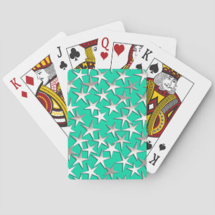 Silver stars on turquoise poker cards