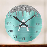 Silver Teal Glitter Brushed Metal Monogram Name Large Clock<br><div class="desc">Silver and Teal Aqua Blue Faux Foil Metallic Sparkle Glitter Brushed Metal Monogram Name and Initial Luxury Wall Clock. This makes the perfect sweet 16 birthday,  wedding,  bridal shower,  anniversary,  baby shower or bachelorette party gift for someone that loves glam luxury and chic styles.</div>