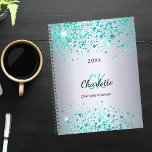 Silver teal glitter name monogram 2026 planner<br><div class="desc">A faux silver looking background decorated with teal,  sea green faux glitter dust. Personalize and add your first name,  monogram initials,  full name and a year.</div>