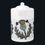 Silver Thistles Tea Pot<br><div class="desc">A lovely pot for your morning Scottish Breakfast tea, or that restorative afternoon Darjeeling. Pair it with our matching mugs, add scones and enjoy!</div>