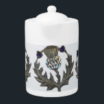 Silver Thistles Tea Pot<br><div class="desc">A lovely pot for your morning Scottish Breakfast tea,  or that restorative  afternoon Darjeeling.  Pair it with our matching mugs,  add scones and enjoy!</div>