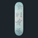 Silver Turtles Beach Style Monogram Coastal Skateboard<br><div class="desc">Silver sea turtles on a beach style turquoise background. Customize it with a name.</div>