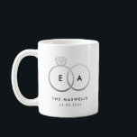 Silver Wedding Ring Monogram with Date Coffee Mug<br><div class="desc">A modern monogram gets glam with intertwined silver wedding rings with easy to personalize text for your initials,  married name and wedding date on this classic white mug making it a fun house warming or an anniversary gift for the newlyweds.</div>