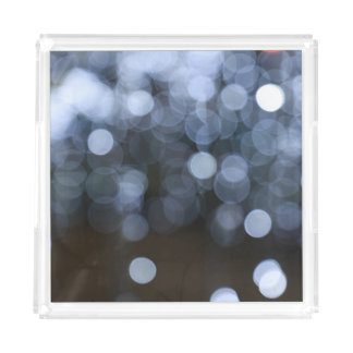 Silver, white bokeh night background. acrylic tray
