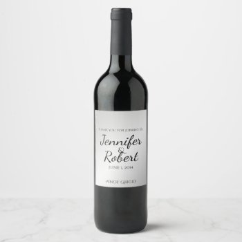 Silver White Snowflake Winter Wine Label by NoteableExpressions at Zazzle