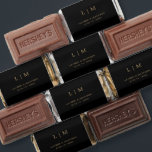 Simple Black and Gold Monogram Elegant Wedding Hershey's Miniatures<br><div class="desc">Simple wedding favor Hershey's Miniature candy featuring a modern yet elegant design with your two letter monogram along with your names and date in faux gold over a black background. The back has your personalized message. The font and background colors may be changed to any colors you wish by clicking...</div>