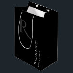 Simple Black Monogram Personalized Groomsmen Mediu Medium Gift Bag<br><div class="desc">This black personalized groomsmen gift bag features personalized groomsman's name,  and calligraphy monogram in grey color. Change background and fonts colors easily if you like.</div>