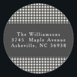 Simple Black Plaid Christmas Return Address Classic Round Sticker<br><div class="desc">Add a charming touch to your mail with this classic gingham return address sticker. Featuring a timeless black-and-white checkered pattern with elegant typography,  this customizable sticker is perfect for wedding invitations,  holiday cards,  or everyday correspondence. Personalize it with your name and address for a polished finishing touch!</div>