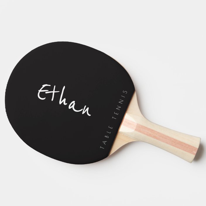 black ping pong paddle