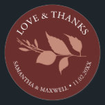 Simple Burgundy Leaves Thank You Wedding Classic Round Sticker<br><div class="desc">These thank you wedding stickers feature a simple yet elegant botanical leaf design in rich burgundy, perfect for a fall autumn wedding. Designed with a classic minimalist touch, this modern template allows you to customize the bride and groom’s names and date in white. Ideal for wedding favors and envelope seals,...</div>