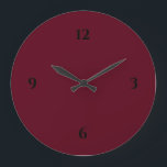 Simple Burgundy Wine & Black Large Clock<br><div class="desc">Modern clock features a minimalist design in a burgundy color palette with black accents. A simple plain design with black numbers on a burgundy wine colored background. A trendy addition to your kitchen, living room or office wall, a thoughtful modern office gift or modern home gift for any occasion. You...</div>