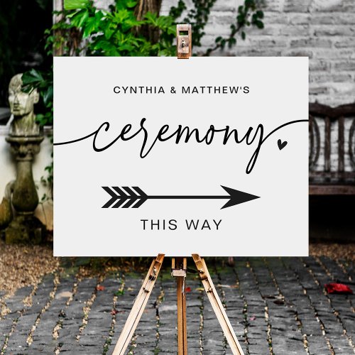 Simple Ceremony Script Wedding Direction Sign - Make your wedding truly one-of-a-kind with this customizable "Simple Ceremony Script Wedding Direction Sign Canvas Print". This elegant sign will not only guide your guests to the right location, but it will also add a sophisticated touch to your overall wedding decor. You have the flexibility to personalize the text and choose your own font style and color to perfectly match the theme of your wedding day. With its unique and personalized design, this direction sign will make your celebration even more memorable.