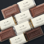Simple Cream Monogram Elegant Wedding Hershey's Miniatures<br><div class="desc">Simple wedding favor Hershey's Miniature candy featuring a modern yet elegant design with your two letter monogram along with your names and date in black over a neutral cream / ivory background. The back has your personalized message. The font and background colors may be changed to any colors you wish...</div>