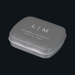 Simple Dark Gray Monogram Elegant Wedding Candy Tin<br><div class="desc">Simple wedding mint candy tin featuring a modern yet elegant design with your two letter monogram along with your names and date in white over a medium gray background. The font and background colors may be changed to any colors you wish by clicking the "customize" button. These chic and stylish...</div>