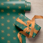 Simple elegant gold snowflakes green Christmas Wrapping Paper<br><div class="desc">Christmas minimal elegant gold copper snowflakes pattern emerald green wrapping paper.</div>