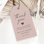 Simple Elegant Light Blush Pink Wedding Thank You Gift Tags<br><div class="desc">Simple Elegant Light Blush Pink Wedding Thank You Gift Tags. This modern wedding or any event Thank You Tag design is simple and minimal with a Plain Solid color Background and trendy signature calligraphy script fonts. Add Your custom couple's Photograph to the back side for a completely personalized look! Shown...</div>