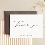 Simple Elegant Minimalist Wedding Thank You Cards<br><div class="desc">Show your appreciation with this Simple Elegant Minimalist Wedding Thank You Card. The beautiful design features a classic black and white color scheme, with modern and minimalist typography and calligraphy. These wedding thank you cards are the perfect way to express your gratitude to your loved ones for celebrating your special...</div>