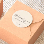 Simple Elegant Thank You Wedding Off White Classic Round Sticker<br><div class="desc">Introducing the Simple, Elegant Thank You Wedding Classic Round Sticker! This sticker is not just a product, it's a timeless expression of gratitude. The exquisite blend of understated chic and classic elements not only elevates the visual appeal but also imparts a personal touch to your wedding favors. So, seal your...</div>