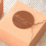 Simple Elegant Thank You Wedding Terracotta Classic Round Sticker<br><div class="desc">Introducing the Simple, Elegant Thank You Wedding Classic Round Sticker! This sticker is not just a product, it's a timeless expression of gratitude. The exquisite blend of understated chic and classic elements not only elevates the visual appeal but also imparts a personal touch to your wedding favors. So, seal your...</div>