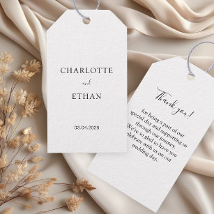 Simple, elegant white invitation gift tags