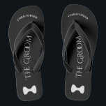 Simple Fun Groom's Name & Bow Tie Wedding Flip Flops<br><div class="desc">These fun flip flops are a designed as a fun way for the groom to save his feet after a long day, and get ready to dance all night long! They feature a simple white on black design with his name at the top, the words "The Groom" spelled out in...</div>