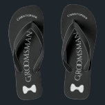 Simple Fun Groomsman Name & Bow Tie Wedding Flip Flops<br><div class="desc">These fun flip flops are a great way to thank the groomsmen at your wedding, and a wonderful way to give his feet a break after a long day! They feature a simple white on black design with his name at the top, the word "Groomsman" spelled out in classy letters...</div>