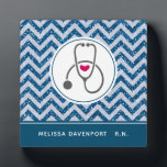 Simple Gray Nursing Stethoscope on Blue Chevron Plaque<br><div class="desc">A photo plaque with an illustration of a gray stethoscope silhouette with a cute red heart set inside a white frame. The background is a blue chevron with faux glitter. No actual glitter,  just a digital image. Along the bottom is a blue border with your personalized name and credentials.</div>