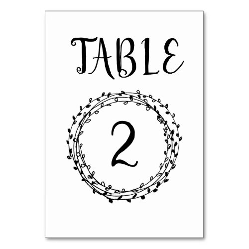 Simple hand drawn wreath wedding table number card