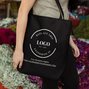 Simple large company white logo website tagline tote bag