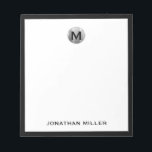 Simple Luxury Monogram Black and Silver Notepad<br><div class="desc">Elevate your note-taking game with this simple yet luxurious notepad featuring a striking black and silver color scheme. The design showcases a classic monogram in bold block typography, personalized with your initial. Perfect for jotting down notes, ideas, or daily tasks, this notepad is a must-have accessory for any busy professional...</div>