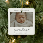 Simple Modern First Christmas as a Grandma Ceramic Ornament<br><div class="desc">A minimalist typography and a modern design for this photo ornament gift. To customize with your favorite baby picture. You can also easily change the color of the font to your liking. Perfect to celebrate your First Christmas as new Grandma.</div>